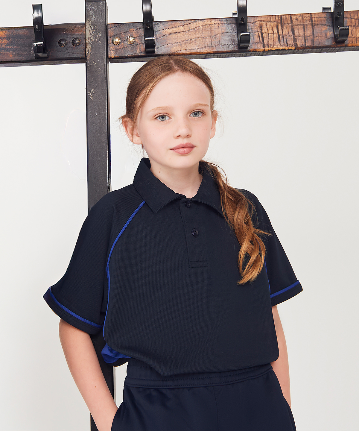 Kids piped performance polo